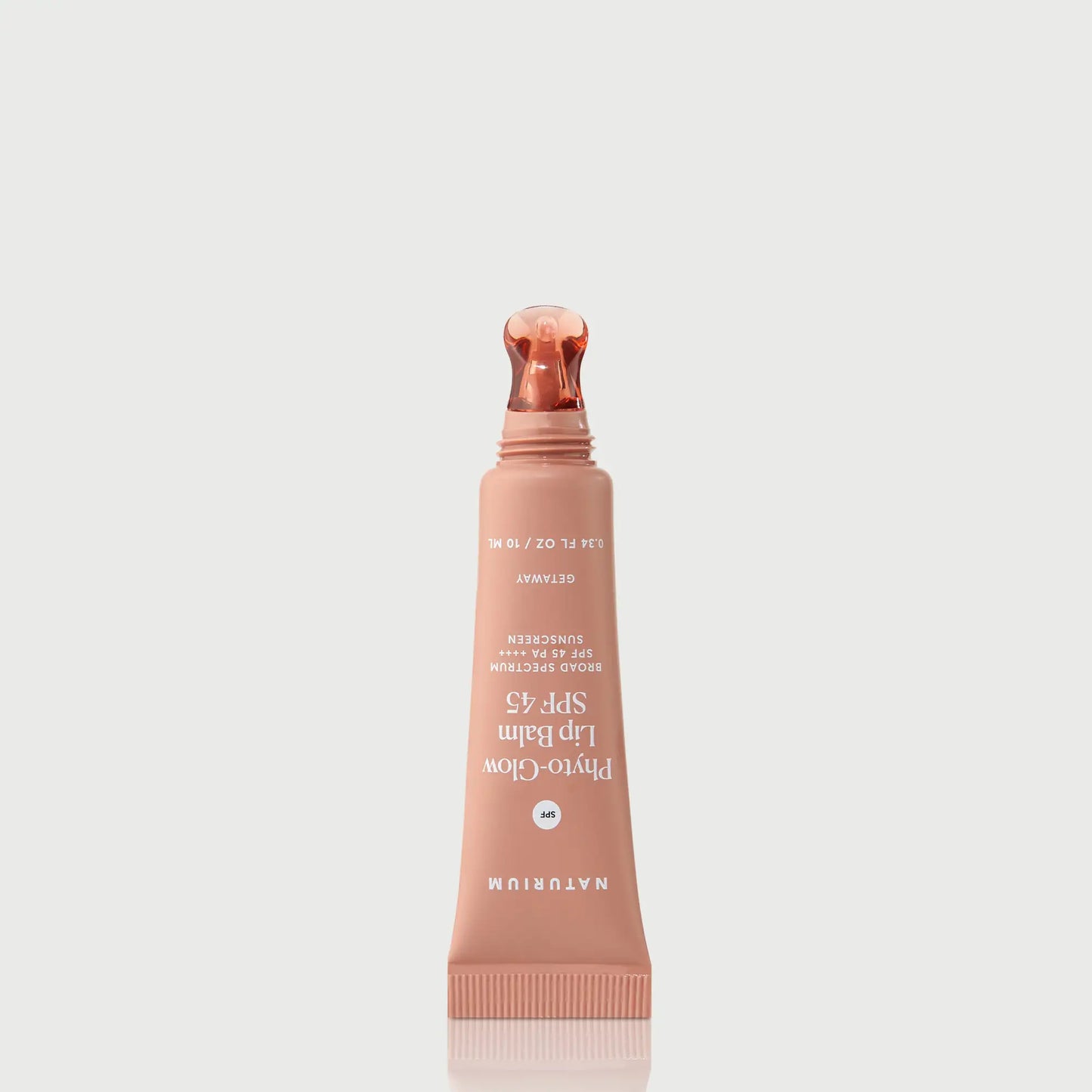 phyto-glow-lip-balm-spf-45-getaway-l7 NATR-10126_PhytoGlow_SPF_Getaway_primary_nocap_bonebkgd_1.webp
