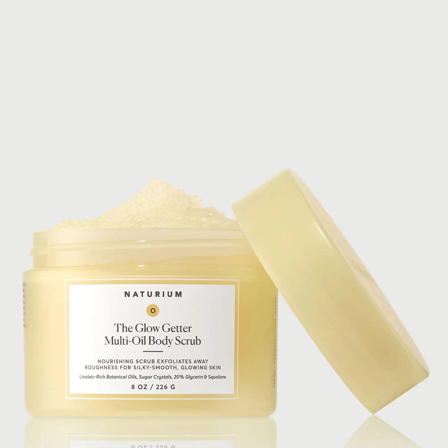 the-glow-getter-multi-oil-body-scrub-a8 NATR-40028-GlowGetter-Multi-Oil-Body-Scrub-Front-CapOff-bonebkgd.webp