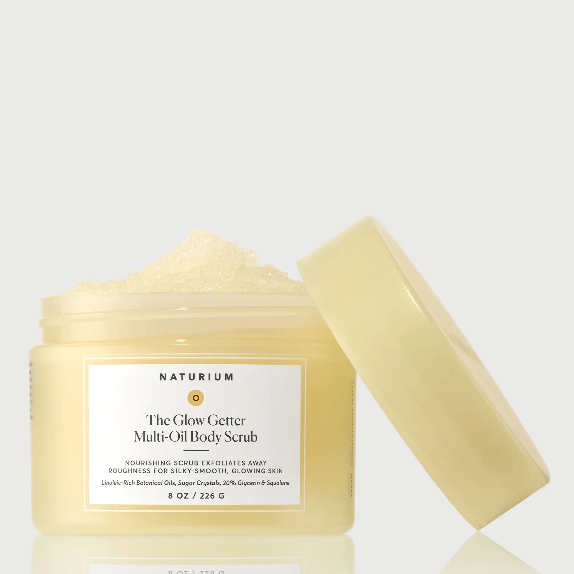 the-glow-getter-multi-oil-body-scrub-a8 NATR-40028-GlowGetter-Multi-Oil-Body-Scrub-Front-CapOff-bonebkgd.webp